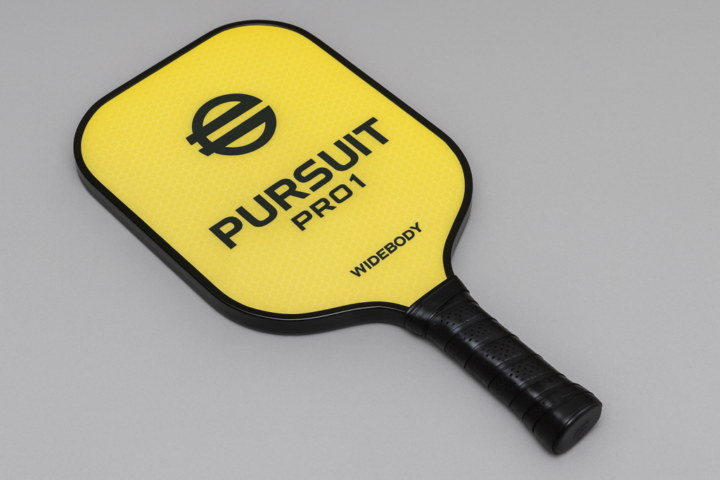 Engage Pursuit Pro1 Widebody pickleball paddle with yellow face on grey background